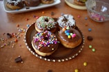 A cheerful group of people enjoying donuts at a party.