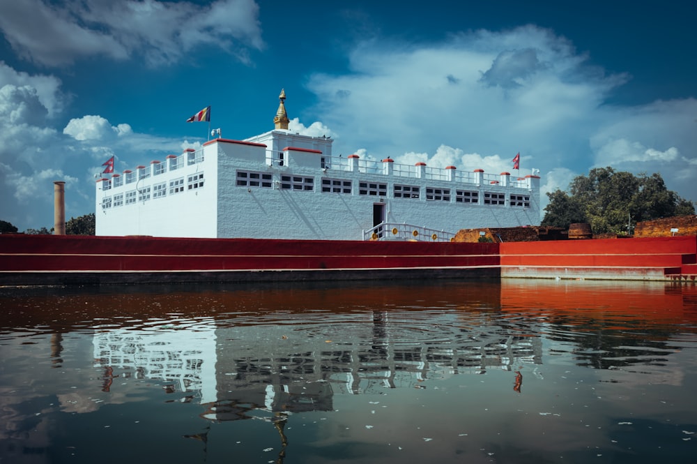 a large red and white boat