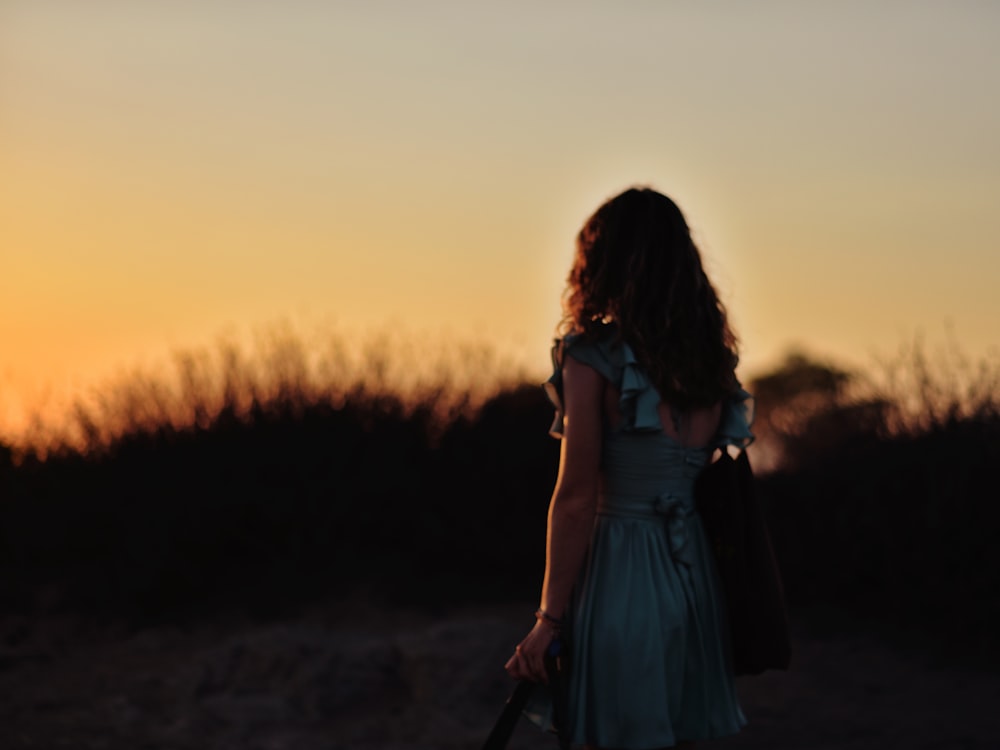 a woman walking on a path