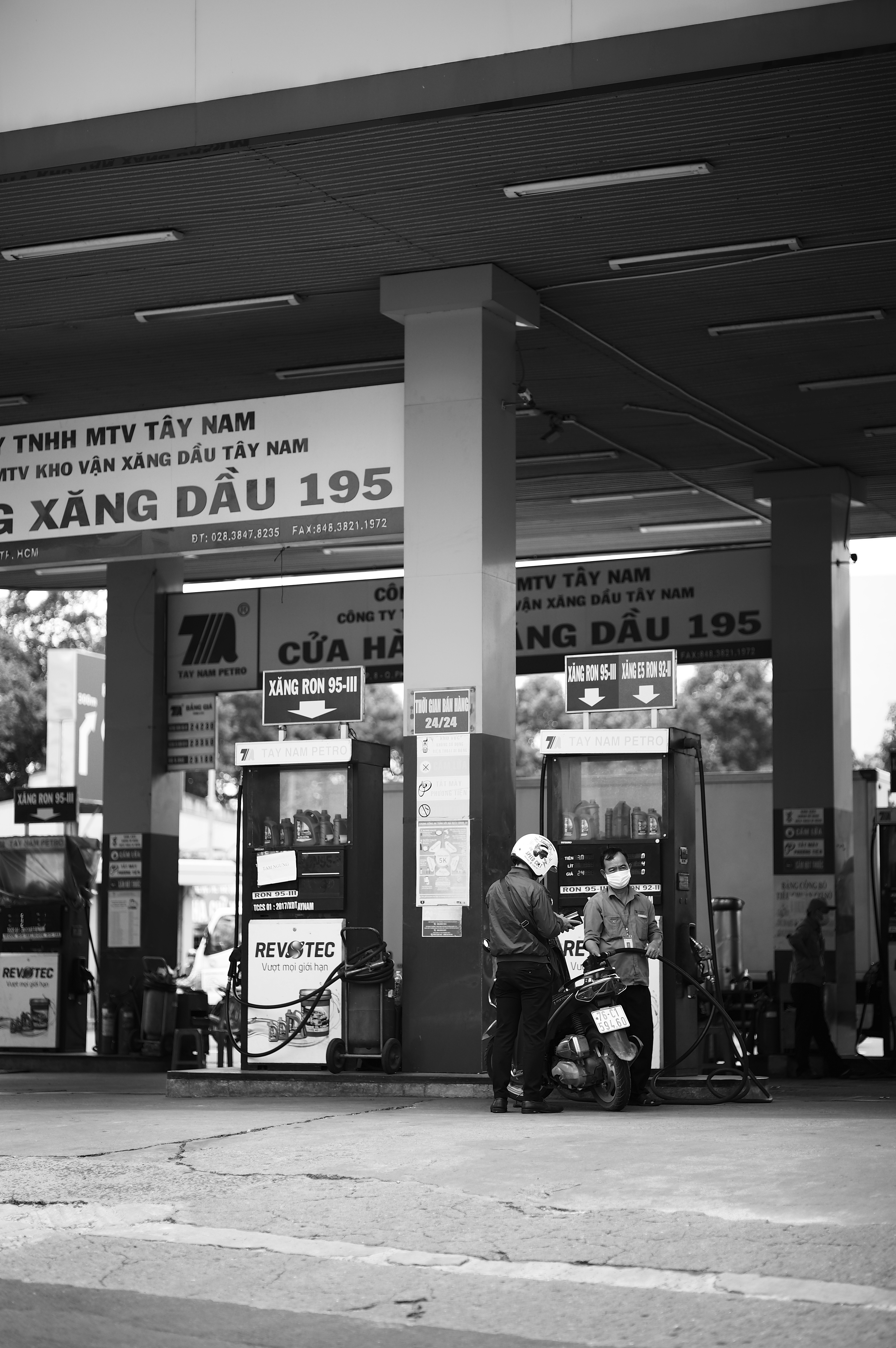 a couple of people stand outside a store
