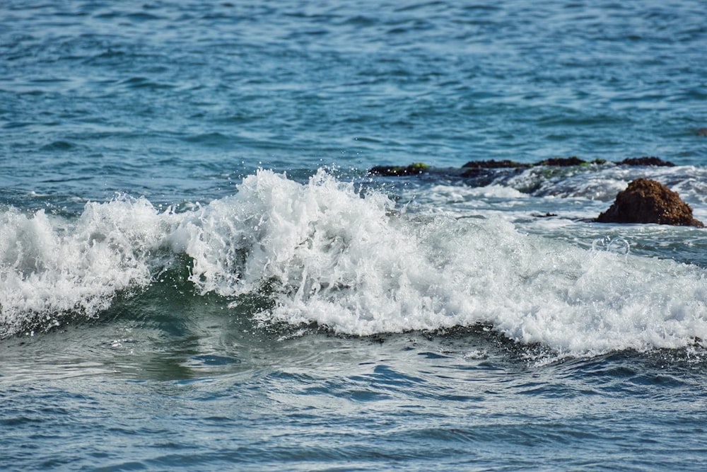 waves crashing on rocks