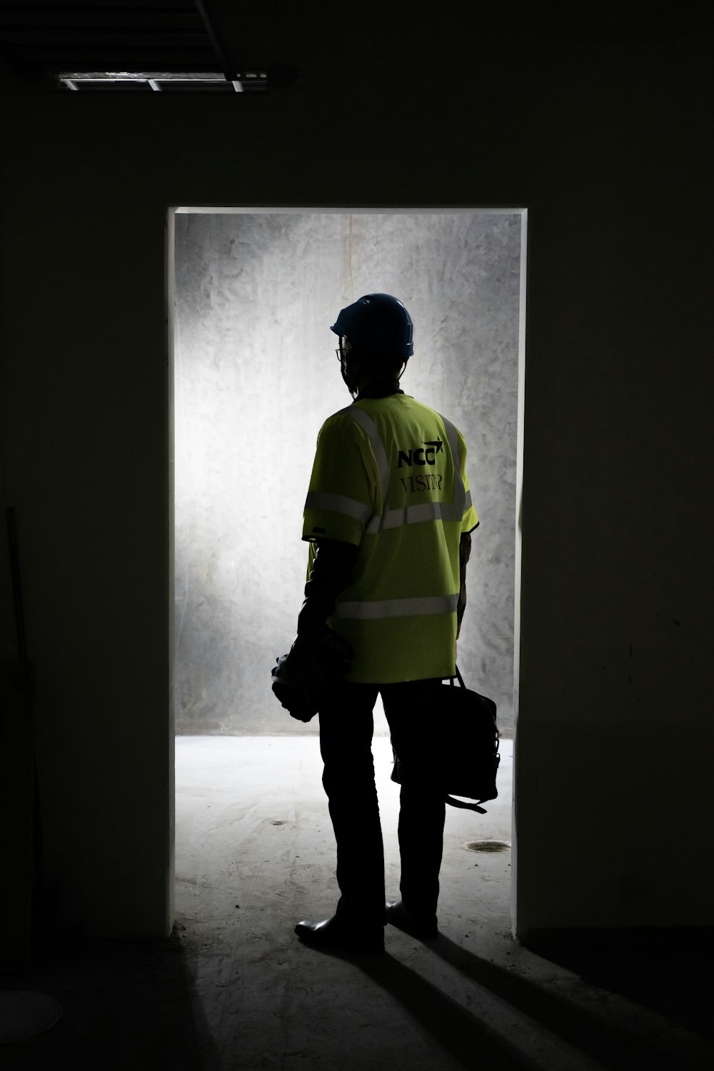 a man in a yellow vest