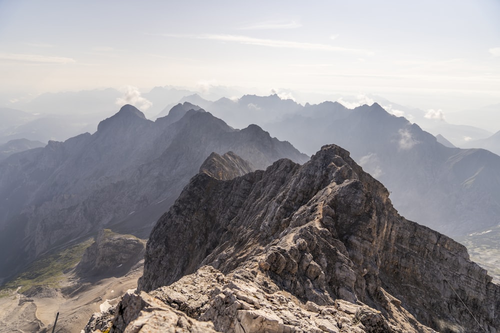 a mountain with a valley below