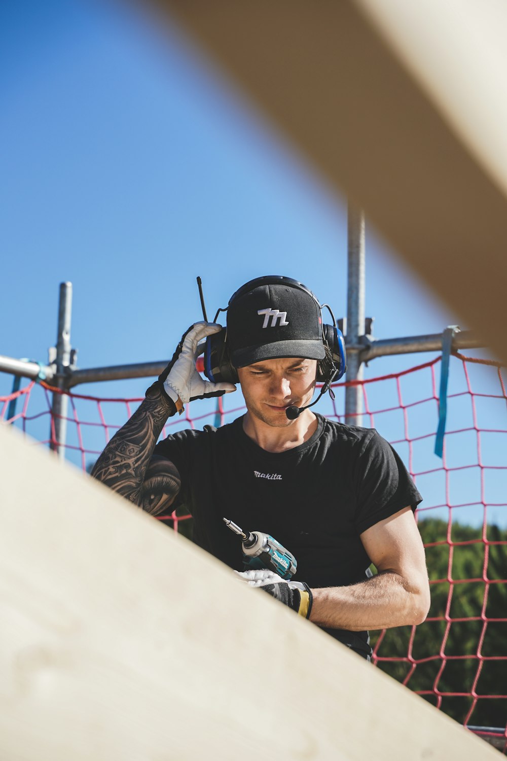 a man wearing a helmet and holding a gun