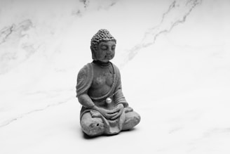 a statue in the snow