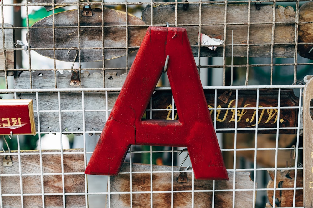 a red and white object in a cage