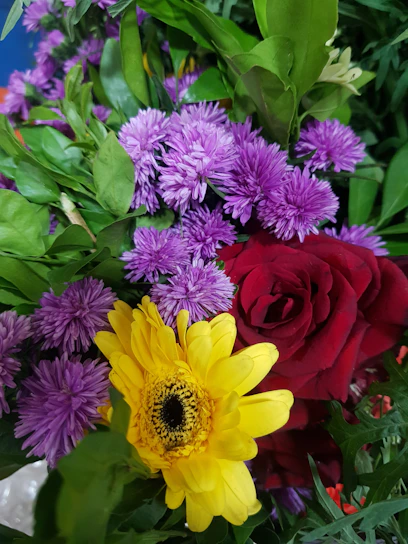 A vibrant bouquet of alstroemeria and gerbera flowers, symbolizing passion and joy.