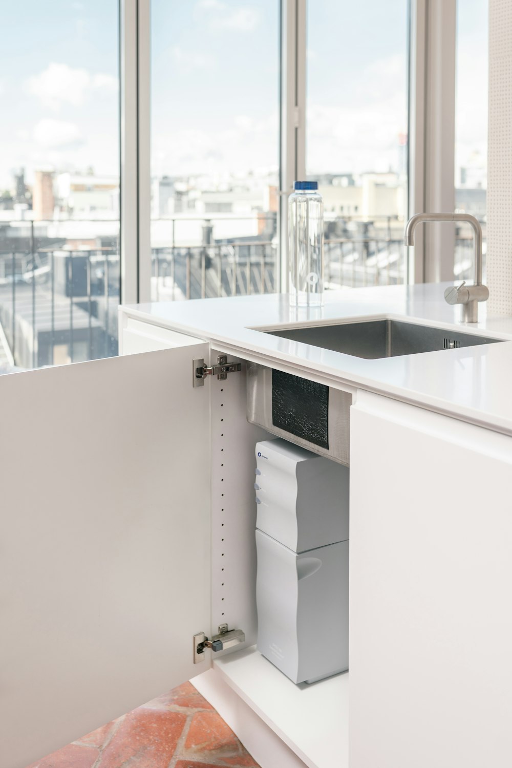 a sink and a faucet in a kitchen