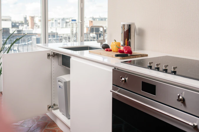 Modern gas range oven in clean bright kitchen interior