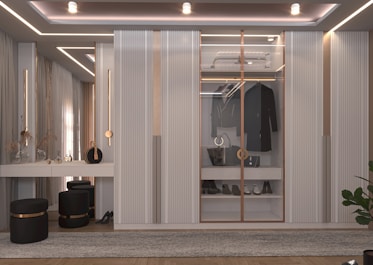 a room with a tv and shelves