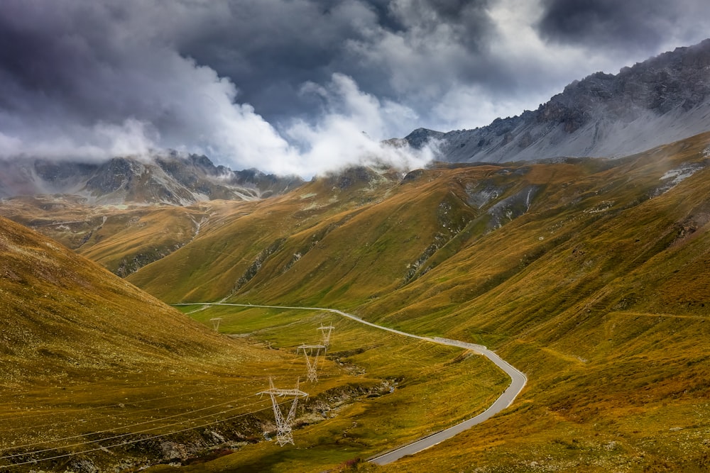 a winding road through a valley