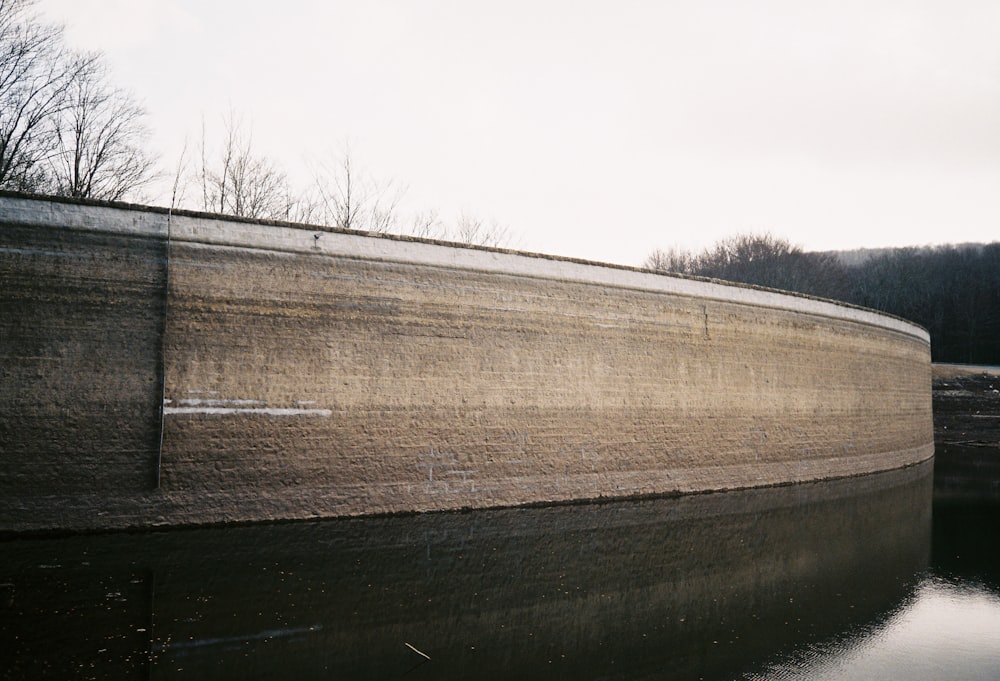 a large dam with a large waterfall