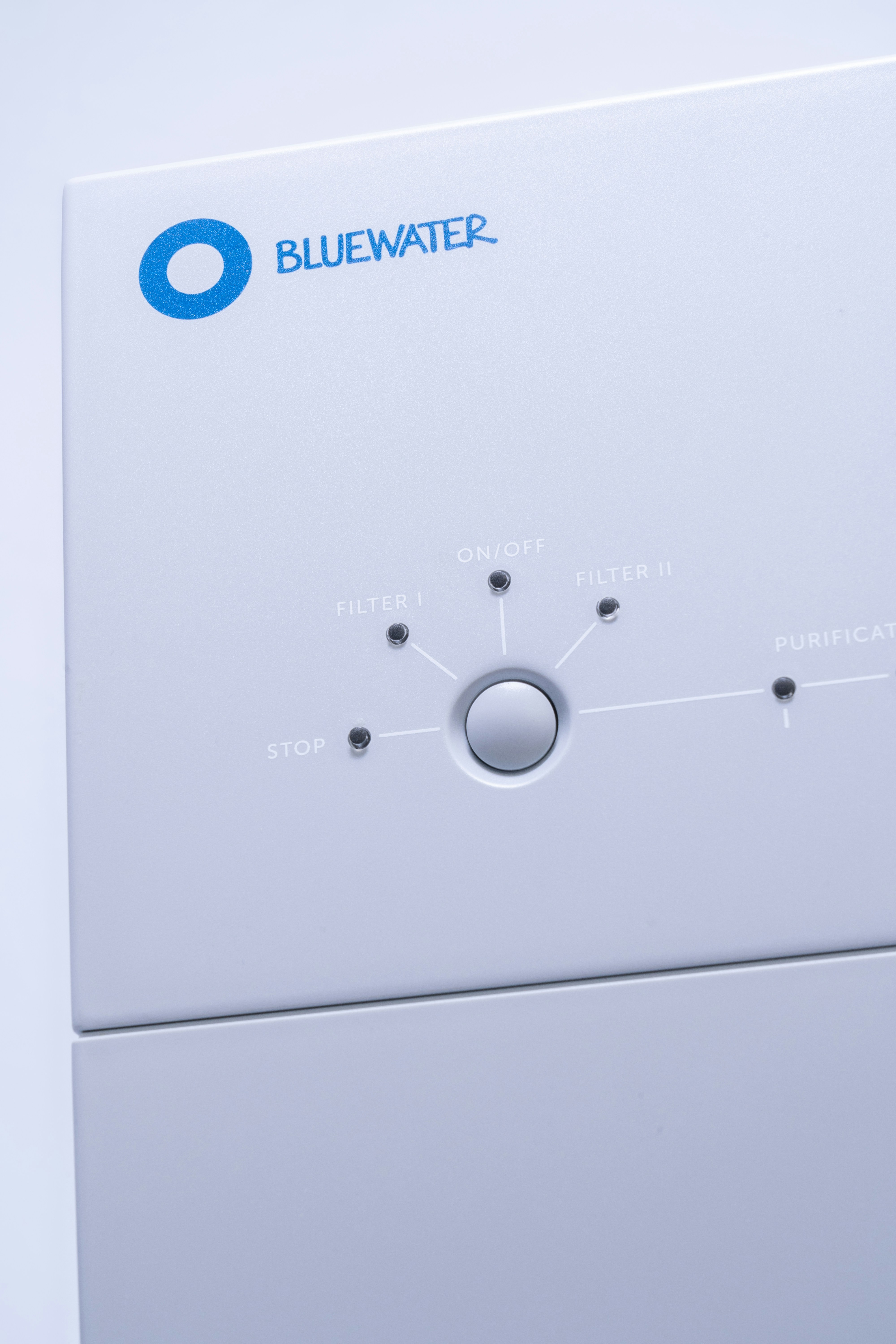 a white rectangular device with a blue screen