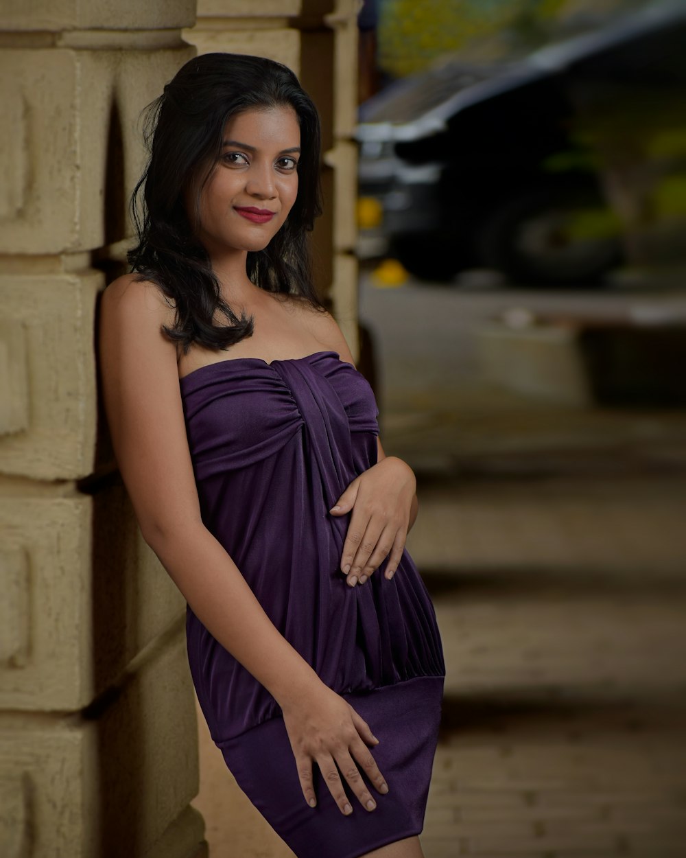 a woman in purple dress