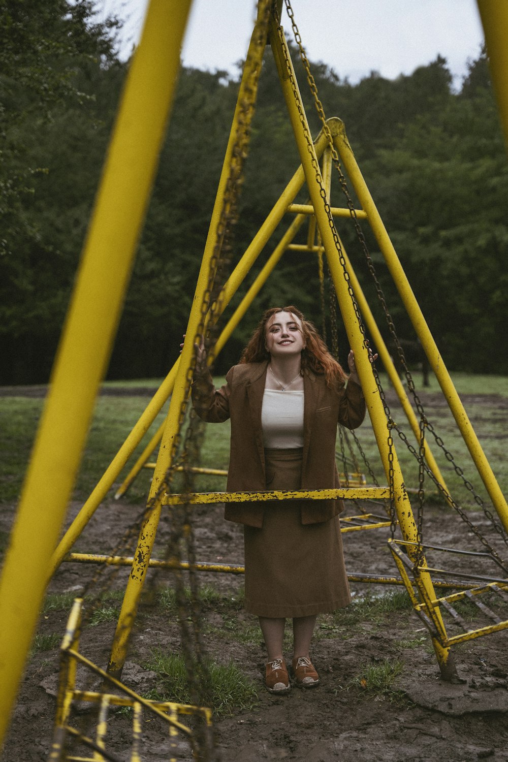 a person standing on a yellow playground