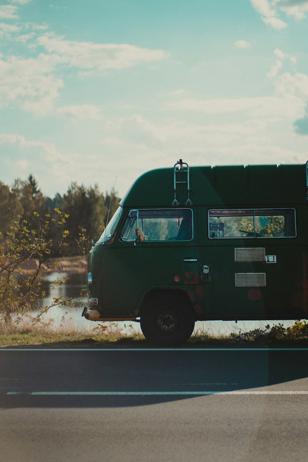 a van parked on the side of a road