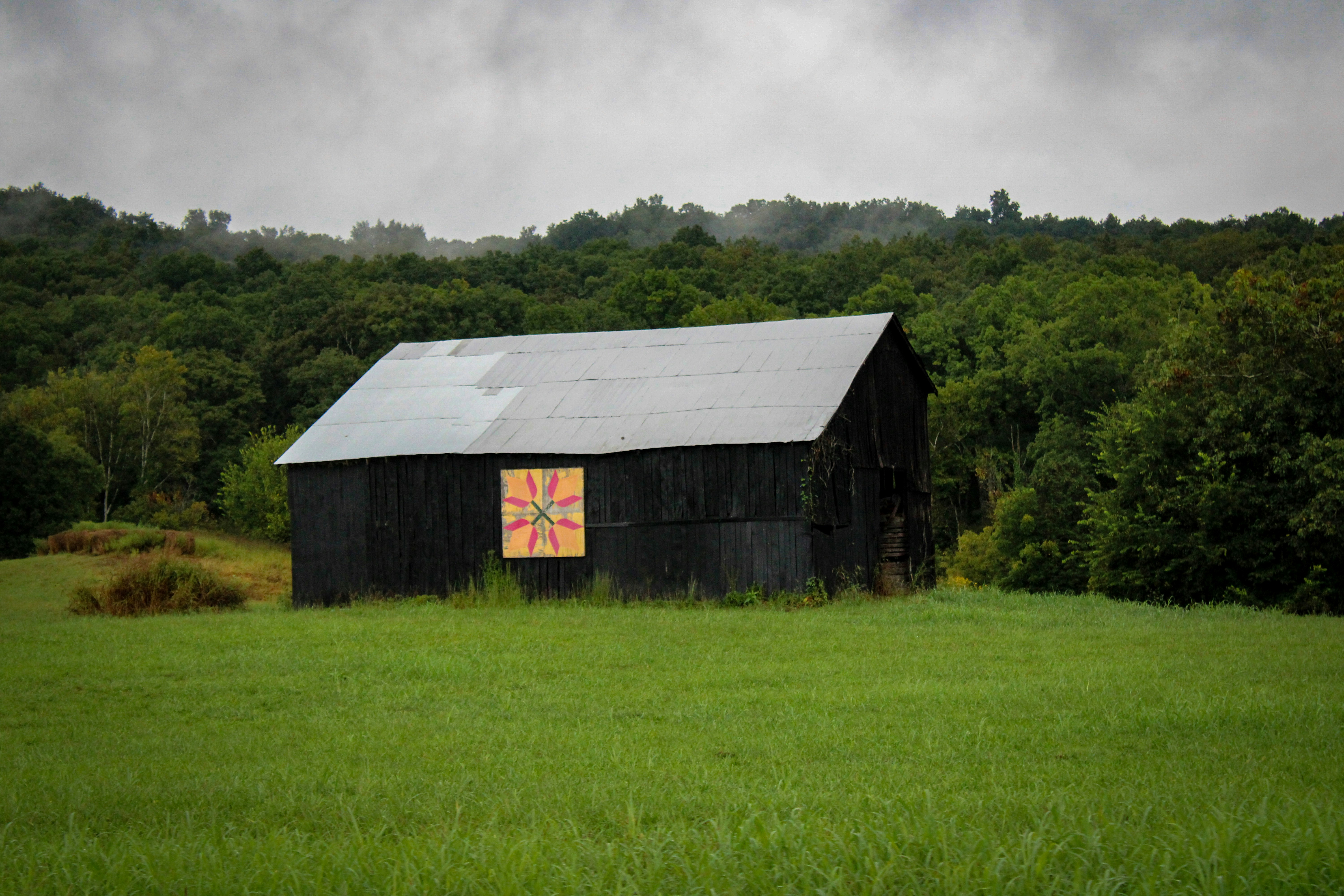 a barn in a field