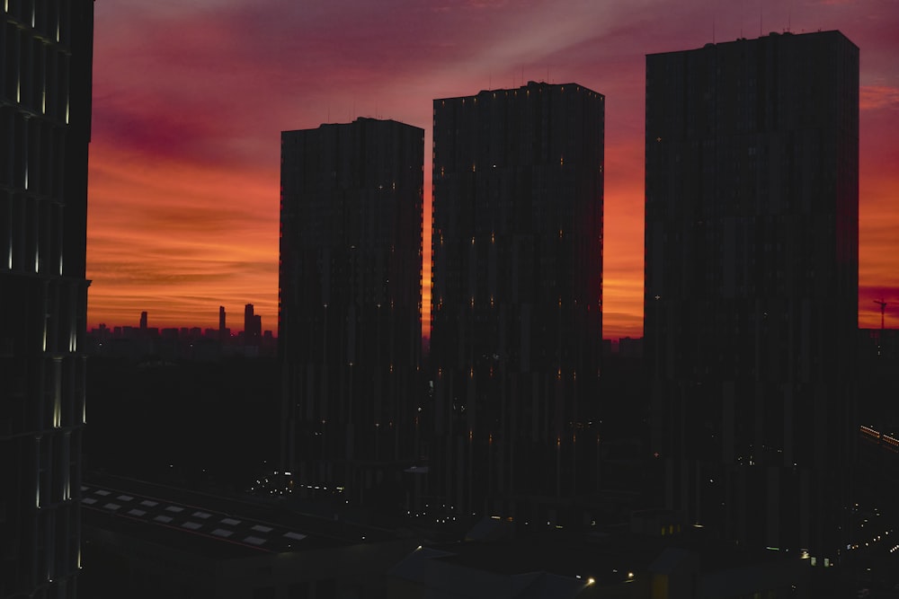 a city skyline at sunset