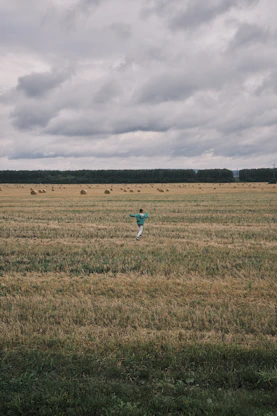 a person walking in a field