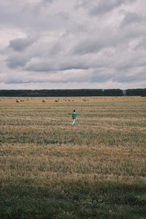 a person walking in a field