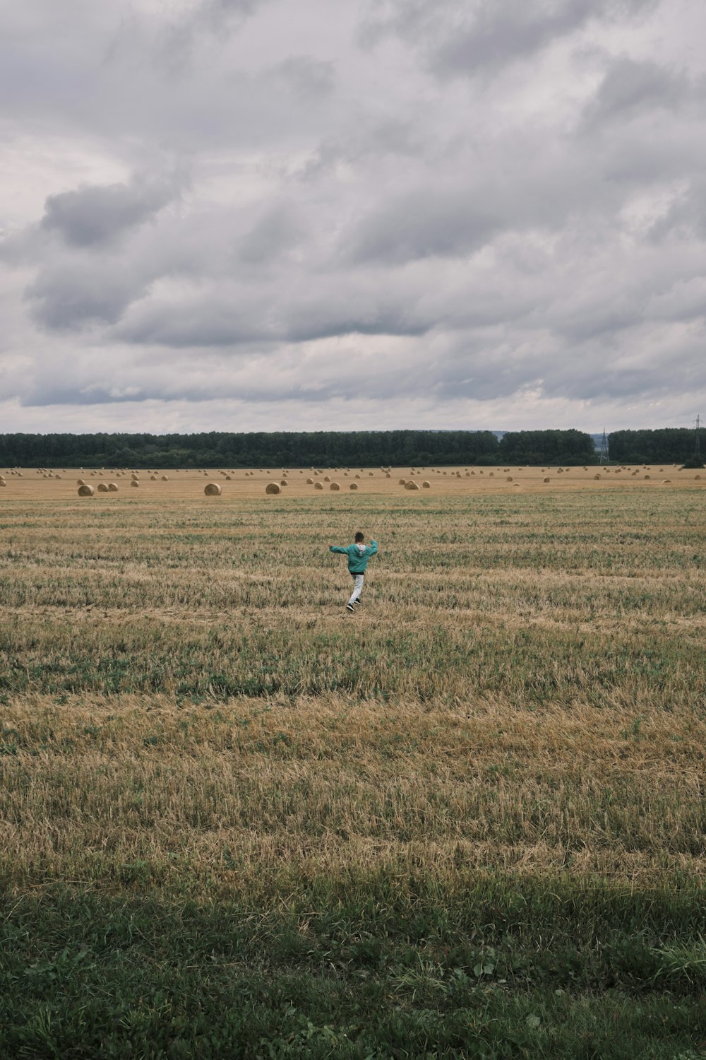 a person walking in a field