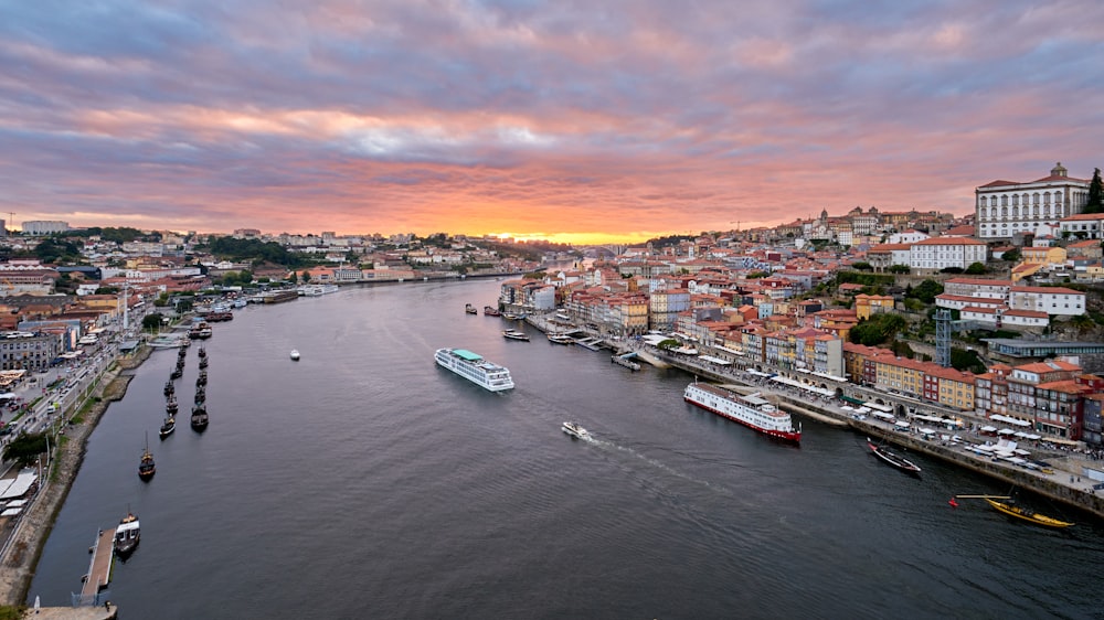 a river with boats and buildings along it