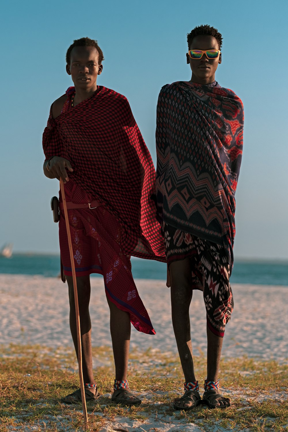 two men wearing clothing