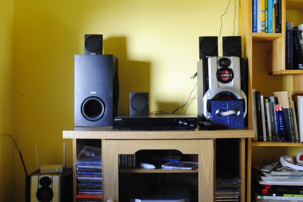 a shelf with speakers and a speaker