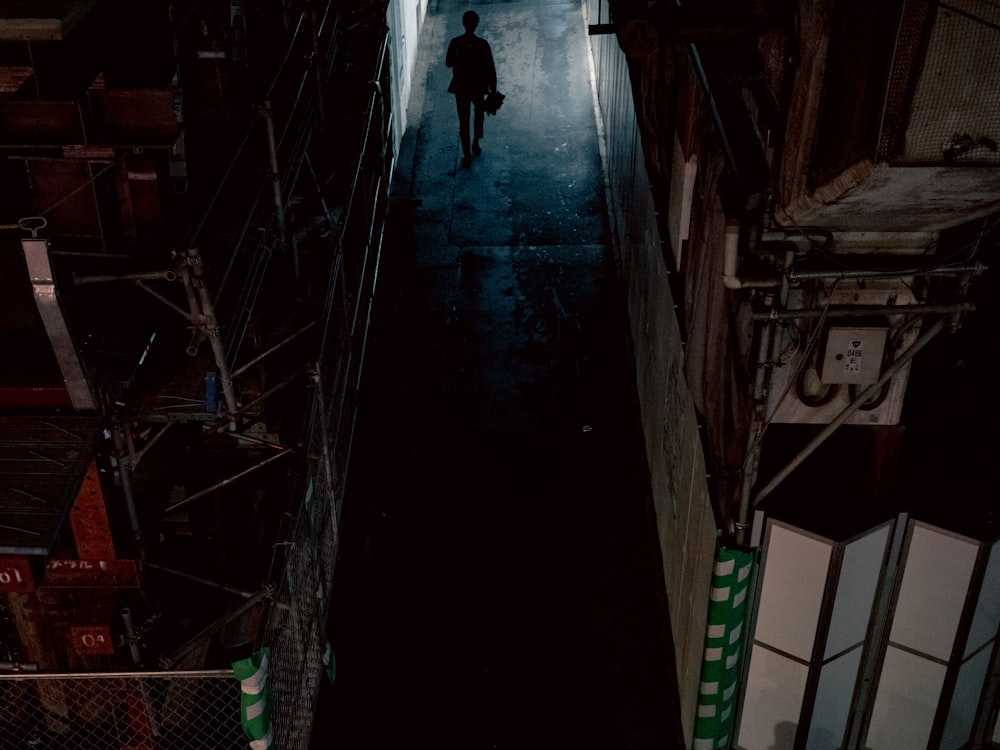 a person walking in a warehouse