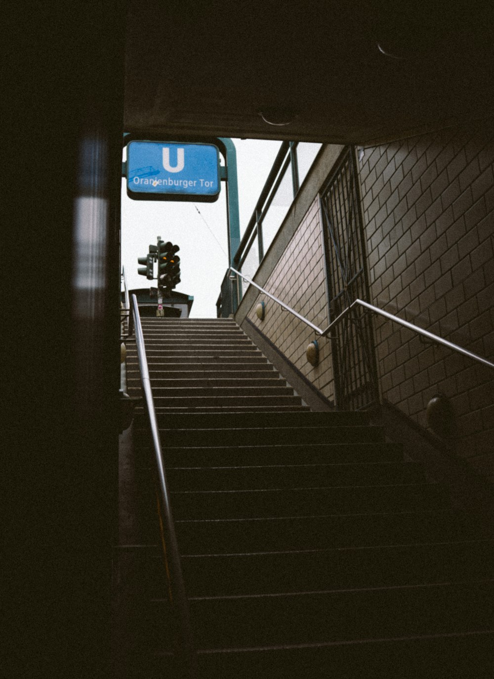 a staircase with a sign on it