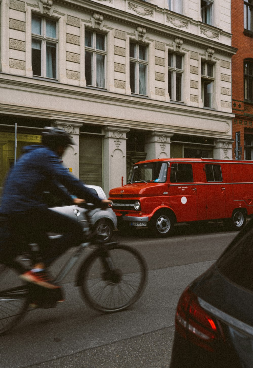 a person riding a motorcycle on a city street