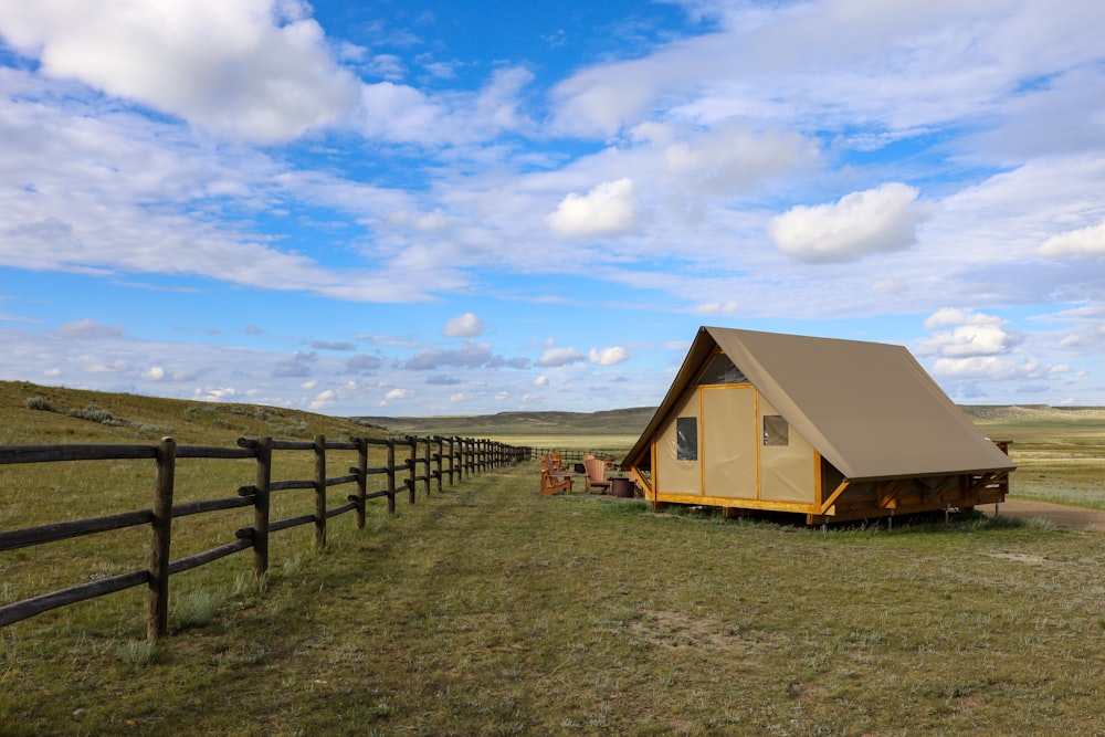 a small house in a field