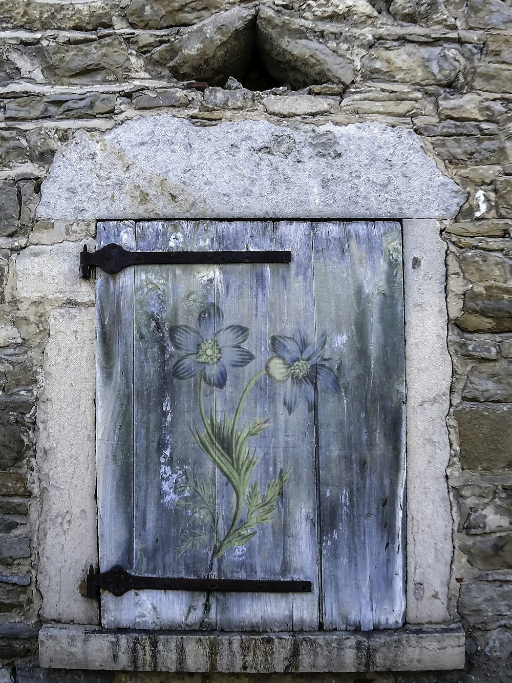 a window with flowers in it