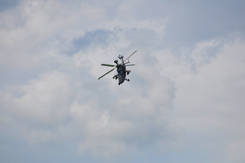 a helicopter flying in the sky