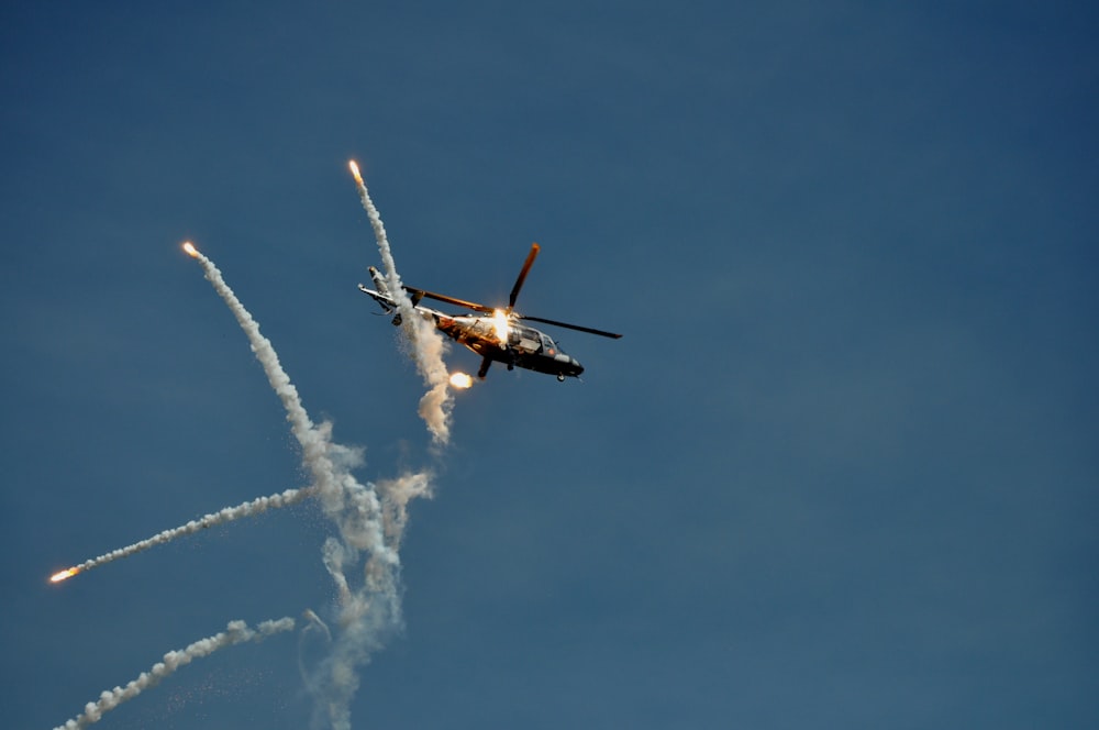 a helicopter flying in the sky