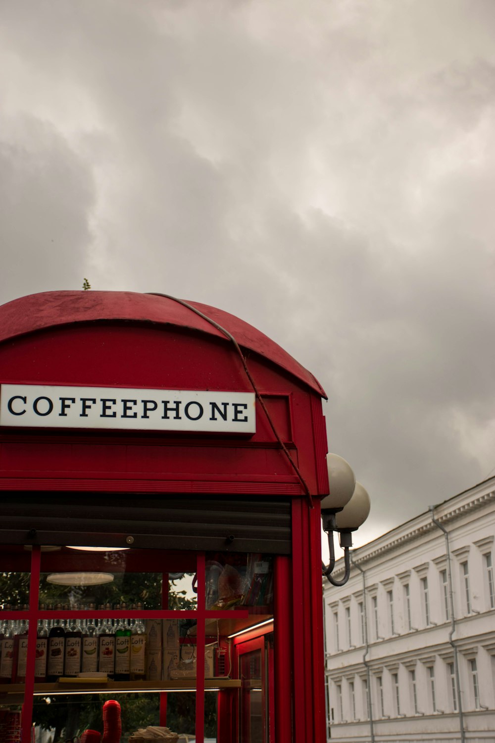 a red booth with a sign on it