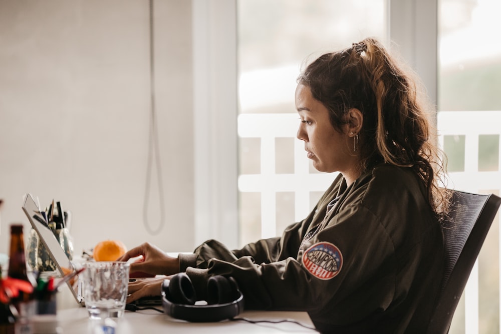 a woman sitting at a table