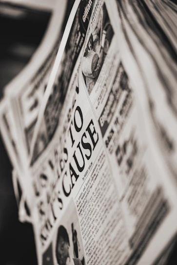 Close-up of a beautifully framed newspaper front page commemorating a wedding anniversary.