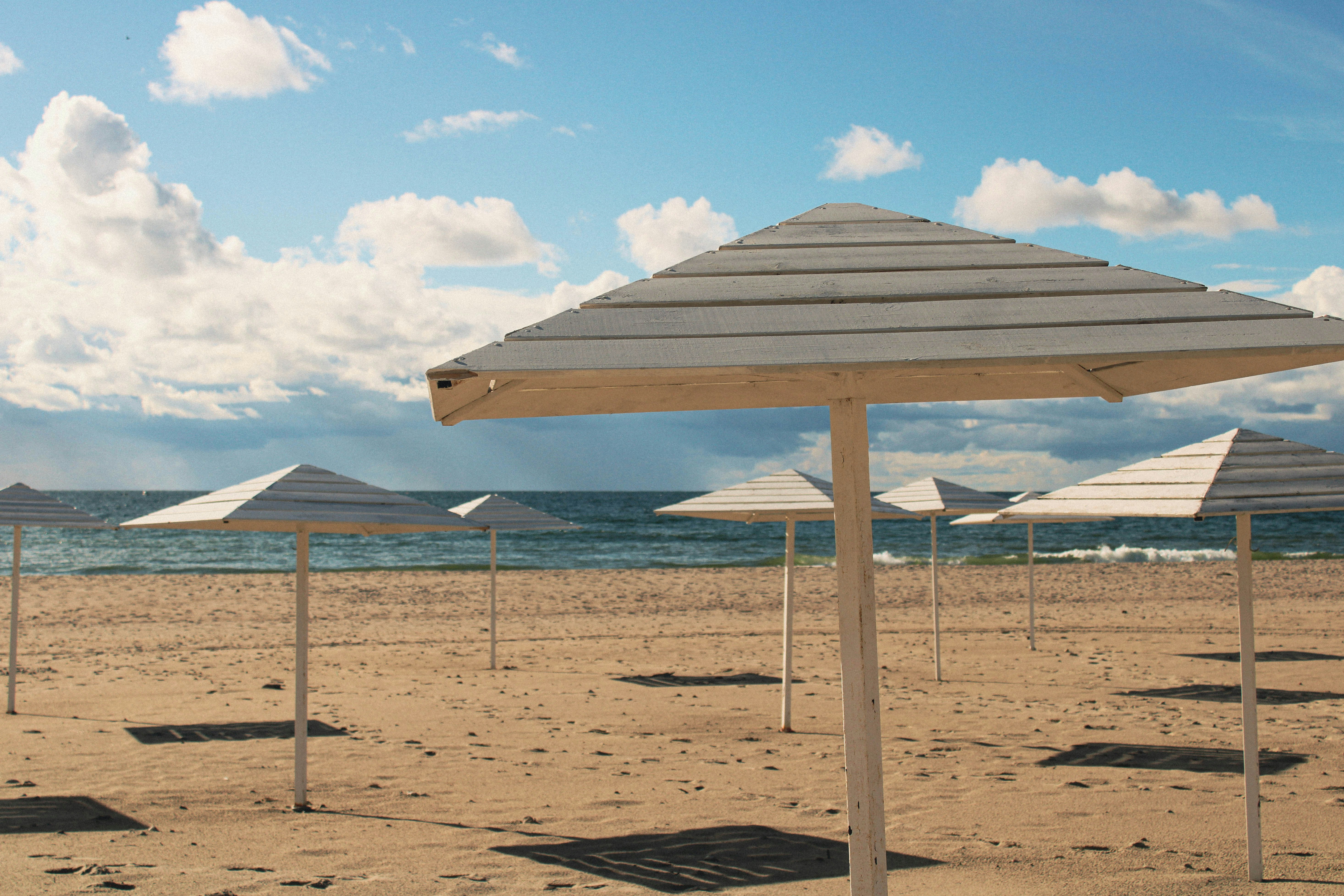 photo-1662486037667-259133860268?ixid=M3wxMjA3fDB8MXxzZWFyY2h8N3x8c3VuZ2xhc3MlMjBodXQlMjBwcm9tb3Rpb25zfGVufDB8fHx8MTc1MzM2OTEyOHww\u0026ixlib=rb-4.1.0