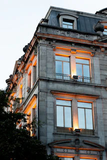 a building with windows and a balcony