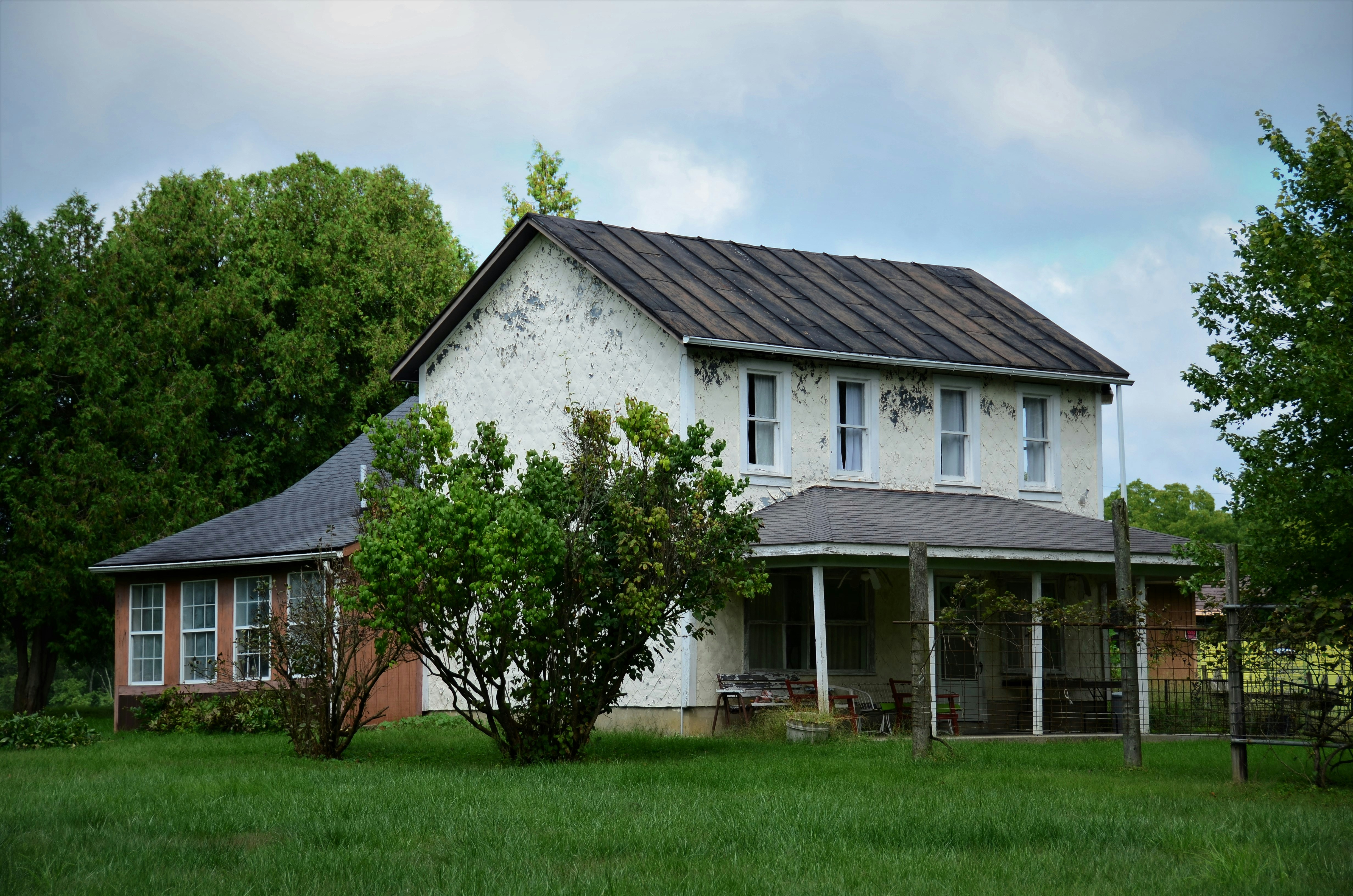 a house with trees in the front