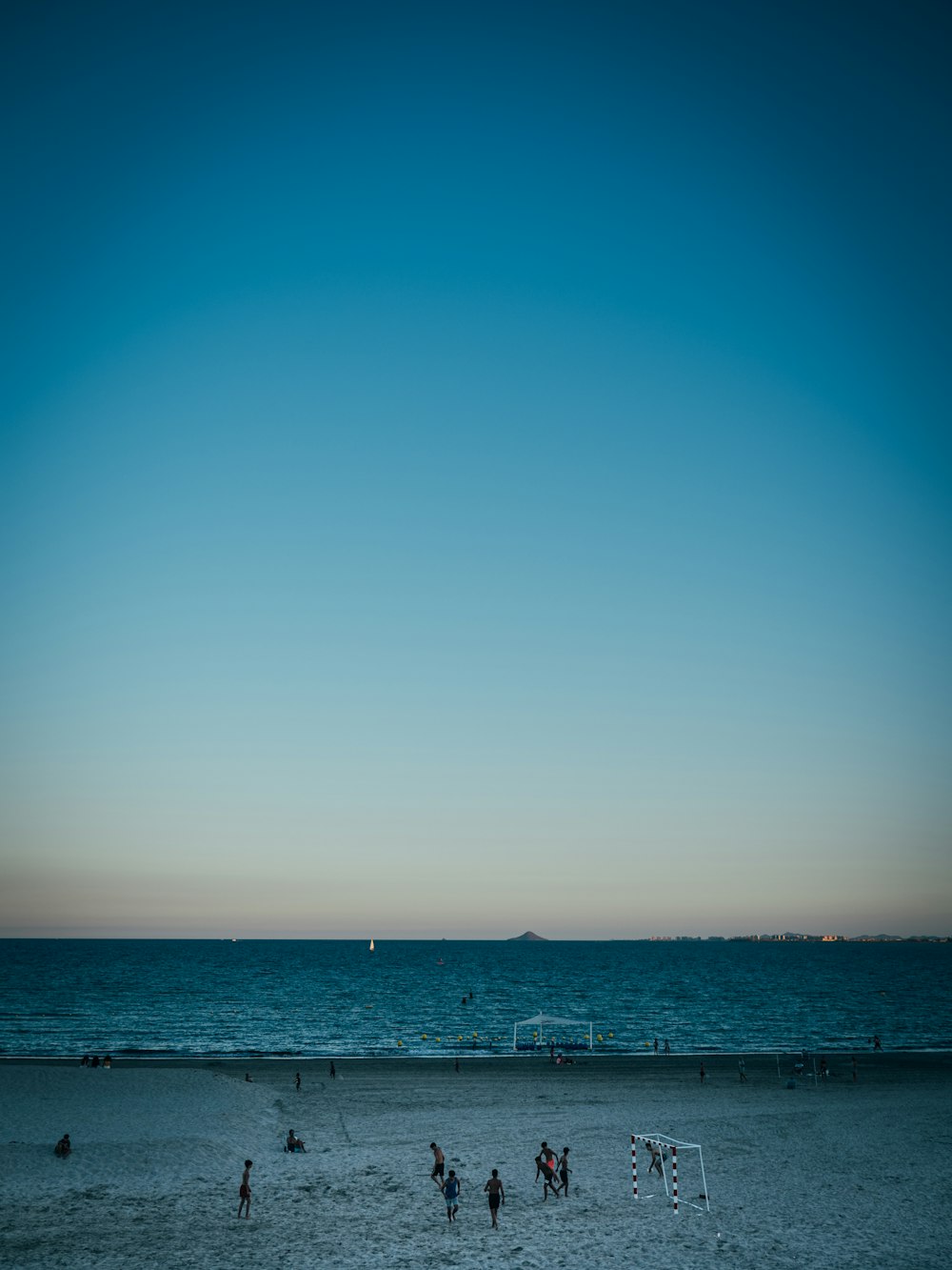 a group of people on a beach