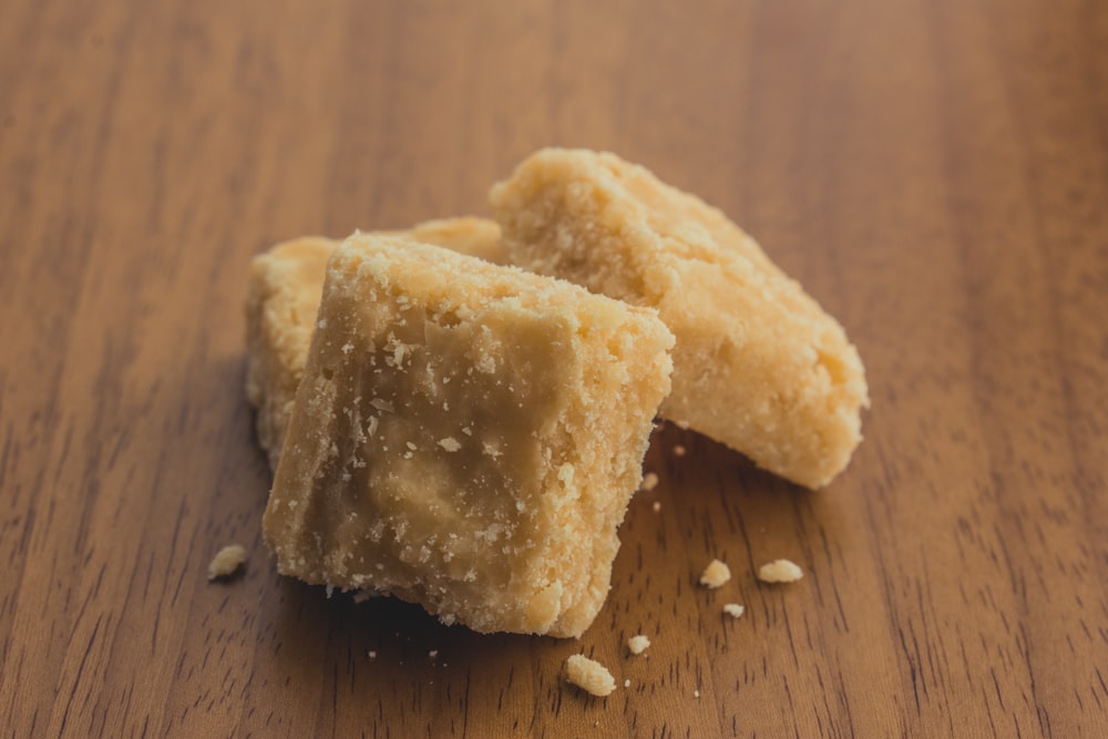 a couple pieces of bread on a table