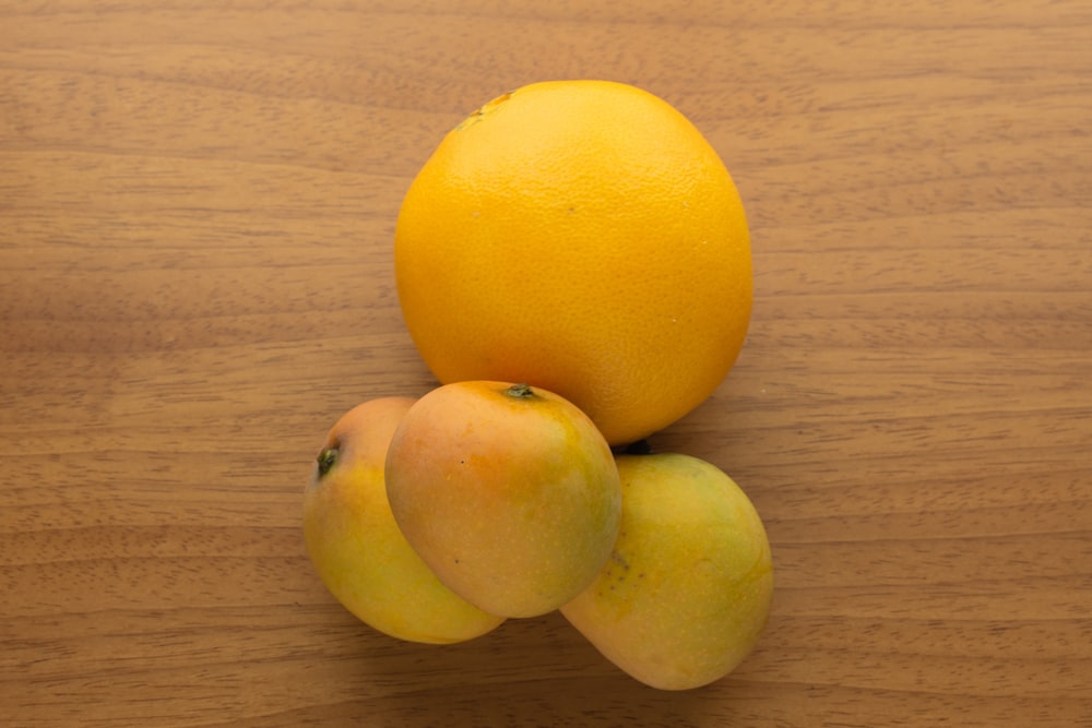 a group of lemons on a table