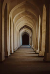 a hallway with arched ceilings