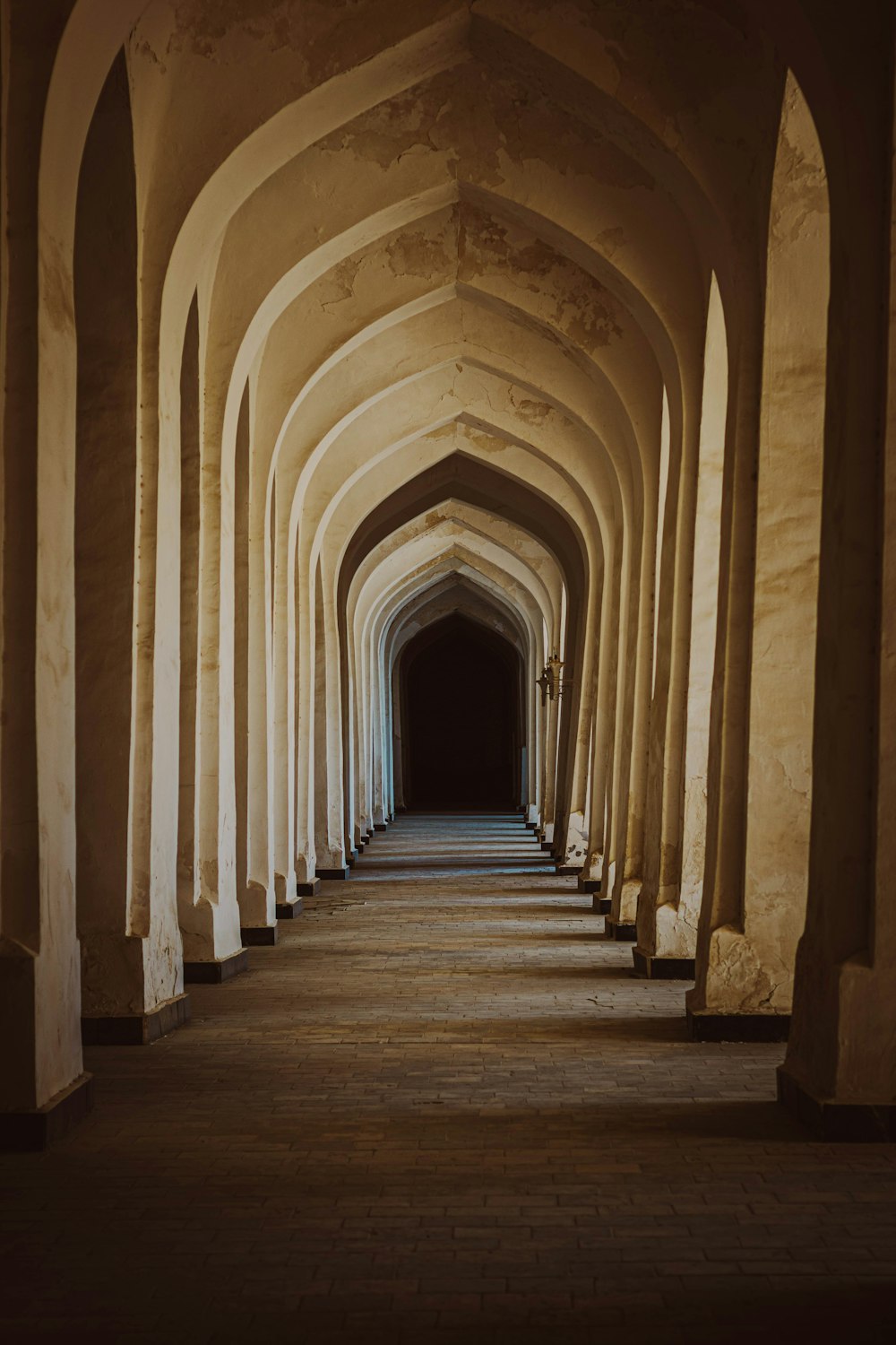 a hallway with arched ceilings