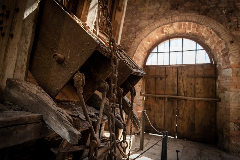 a wooden structure with a wheel