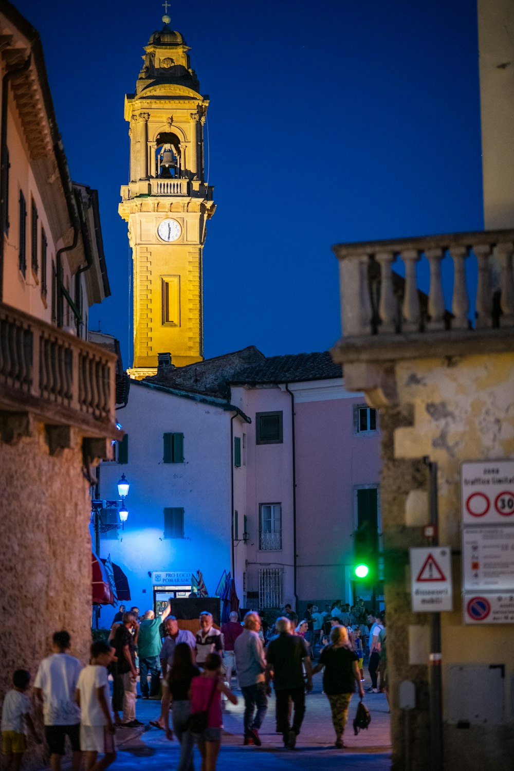 a group of people walking in a city