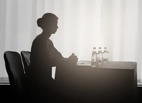 a person sitting at a table