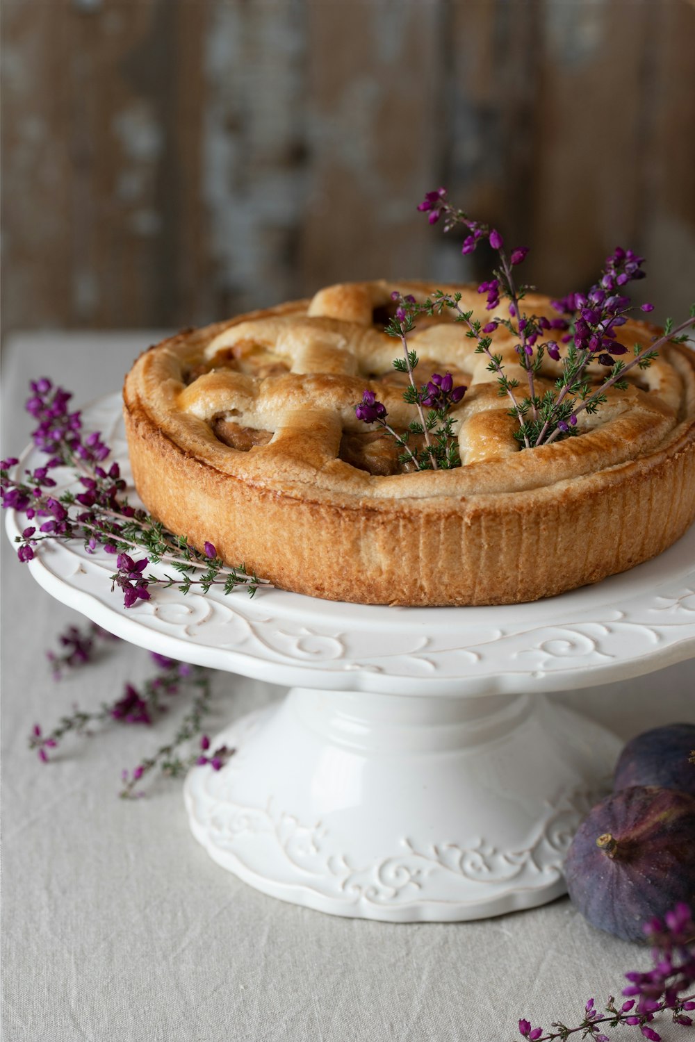 a cake with frosting and flowers